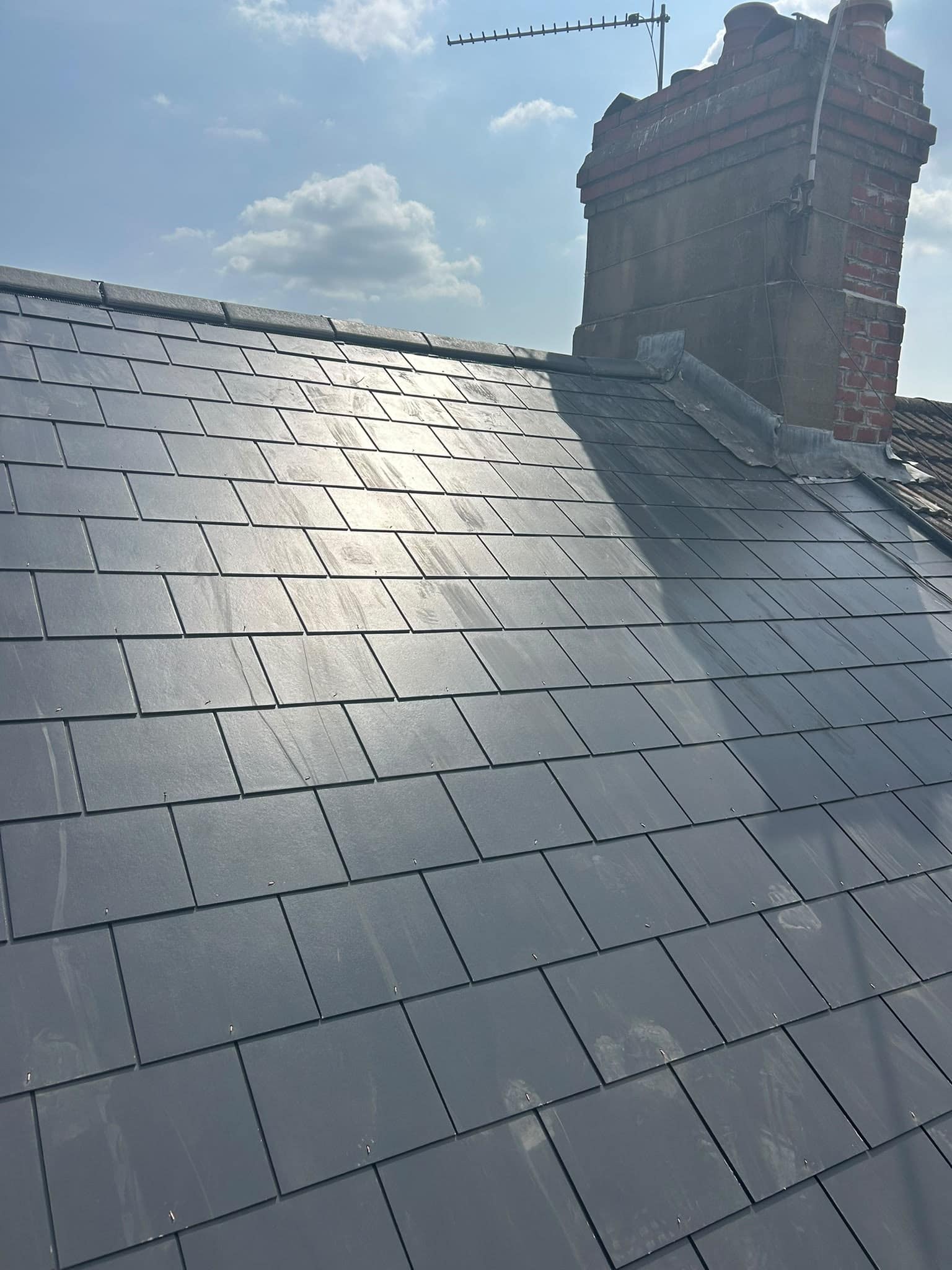 New front main roof replacement using fibre-slate in Canton Cardiff_after man-made fibre slate roof replacement in Canton Cardiff